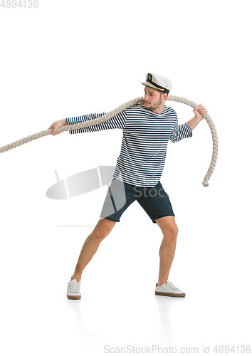 Image of Caucasian male sailor in uniform isolated on white studio background