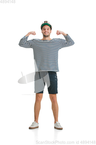 Image of Caucasian male sailor in uniform isolated on white studio background