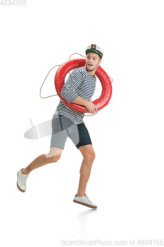 Image of Caucasian male sailor in uniform isolated on white studio background