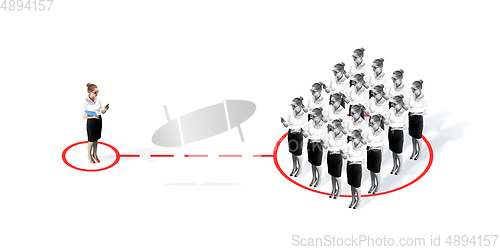 Image of Studio shot of people demonstrating social distancing with arrows indicating the separation.