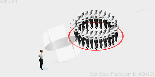 Image of Studio shot of people demonstrating social distancing with arrows indicating the separation.