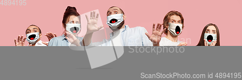 Image of Group of frightened people, women and men wearing protective face mask on pink coral background