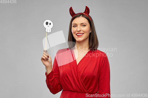 Image of happy woman in red halloween costume of devil