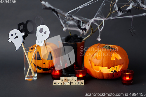 Image of happy halloween toy blocks and party decorations