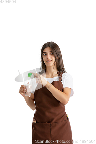 Image of Young woman, visagiste with cosmetics isolated on white studio background