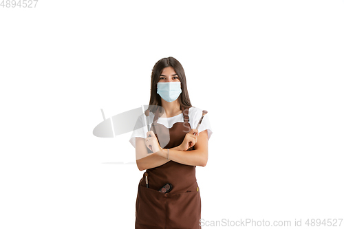 Image of Young woman, visagiste with cosmetics isolated on white studio background