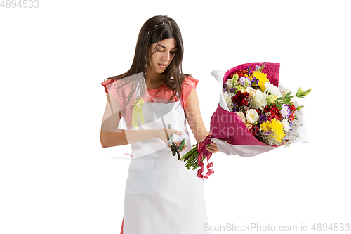 Image of Young woman, florist with bouquet isolated on white studio background