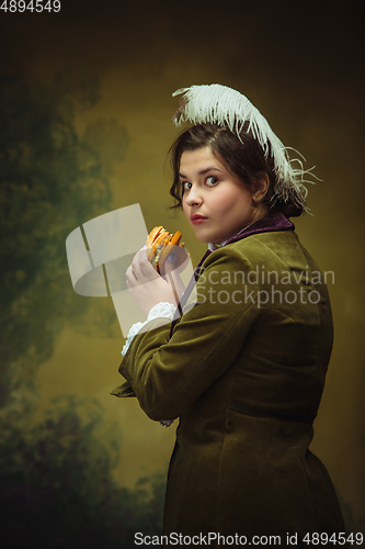 Image of Modern trendy look, portrait of renaissance period beautiful woman. Retro style, comparison of eras concept.