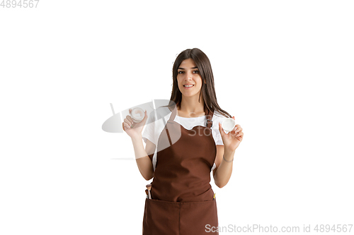 Image of Young woman, visagiste with cosmetics isolated on white studio background