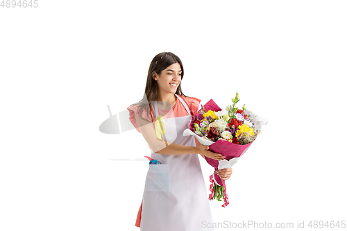 Image of Young woman, florist with bouquet isolated on white studio background