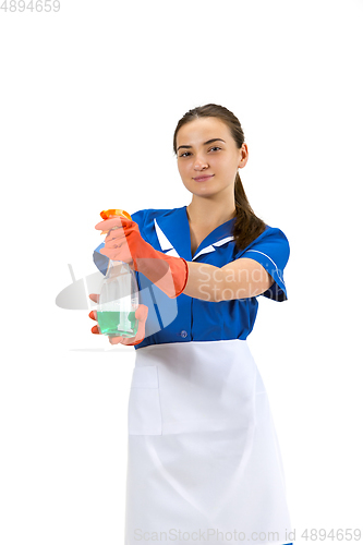 Image of Portrait of female made, cleaning worker in white and blue uniform isolated over white background