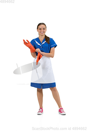 Image of Portrait of female made, cleaning worker in white and blue uniform isolated over white background