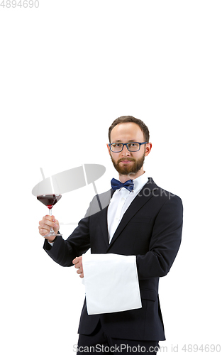 Image of Portrait of male sommelier in suit isolated over white background