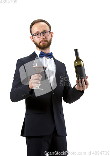 Image of Portrait of male sommelier in suit isolated over white background