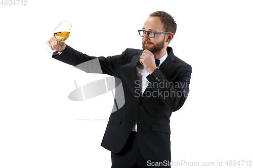 Image of Portrait of male sommelier in suit isolated over white background