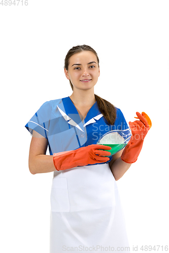 Image of Portrait of female made, cleaning worker in white and blue uniform isolated over white background