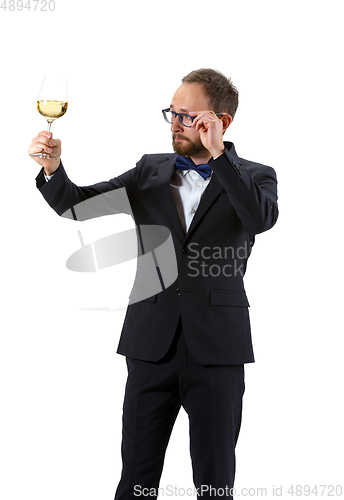 Image of Portrait of male sommelier in suit isolated over white background