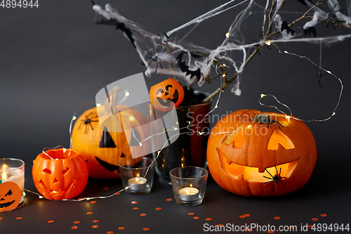 Image of pumpkins, candles and halloween decorations
