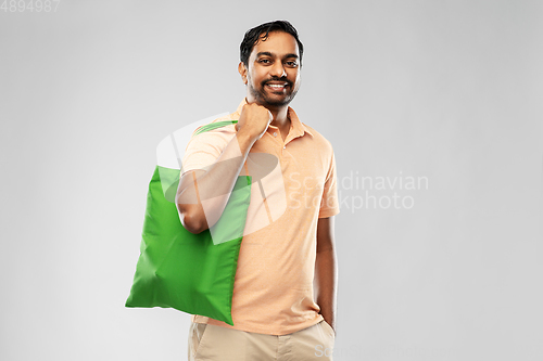 Image of man with reusable canvas bag for food shopping