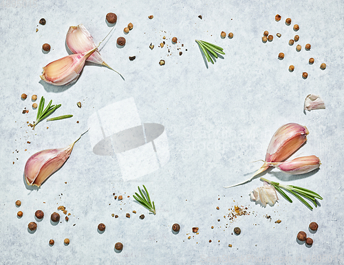 Image of garlic cloves and spices
