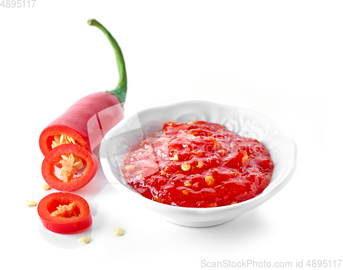 Image of bowl of red hot chili pepper sauce