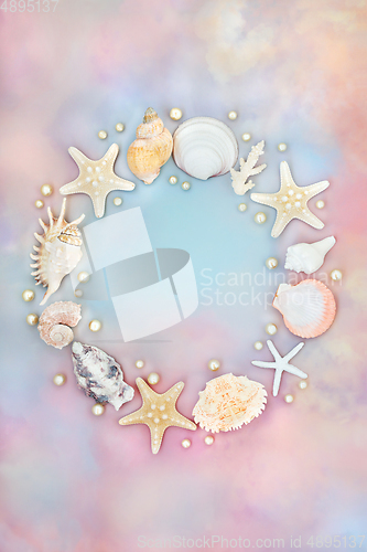 Image of Beautiful Sea Shell Wreath on Rainbow Sky Cloud Background