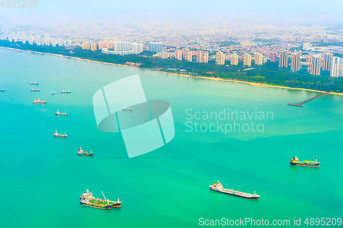 Image of Singapore harbor with freight ships