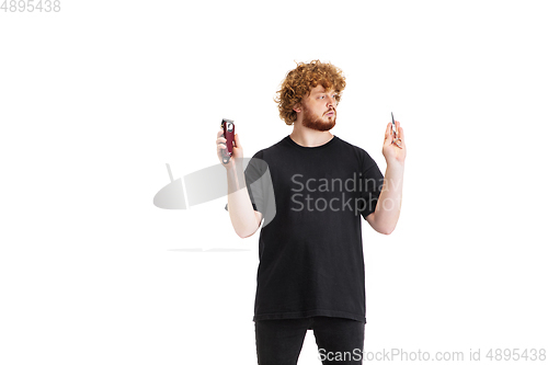 Image of Stylish hairdresser, barber isolated on white studio background