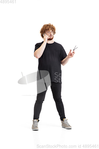 Image of Stylish hairdresser, barber isolated on white studio background