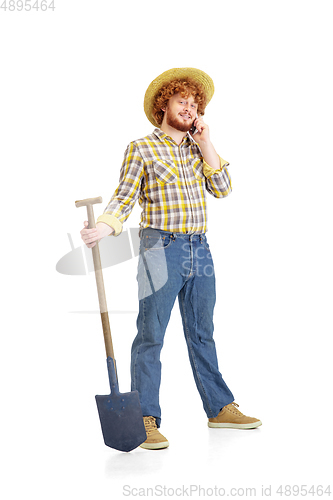 Image of Handsome farmer, rancher isolated over white studio background