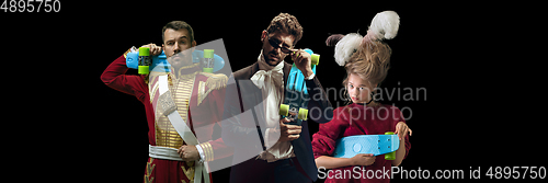 Image of Collage on young people in medieval attire on dark background. Retro style, comparison of eras concept.