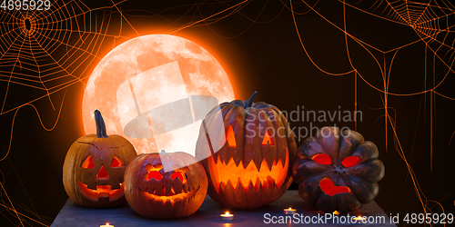 Image of Scary pumpkin on orange background, the night of fear