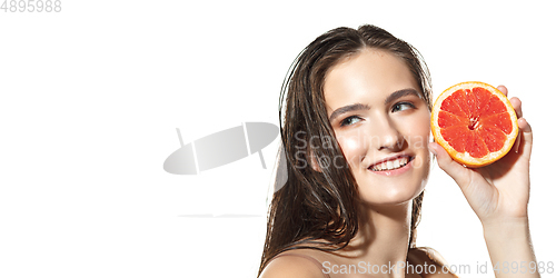 Image of Beautiful face of young woman with clean fresh skin. Flyer with copyspace