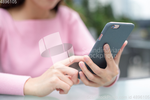 Image of Woman use of cellphone