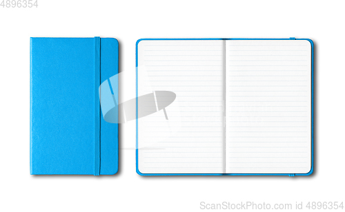 Image of Cyan blue closed and open lined notebooks isolated on white