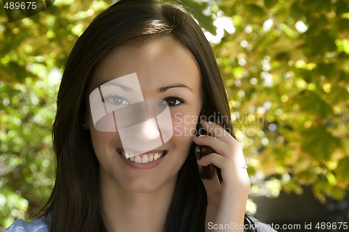 Image of Beautiful Girl Talking on the Phone