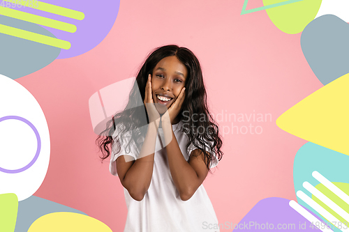 Image of African-american woman portrait isolated on bright, modern illustrated background.