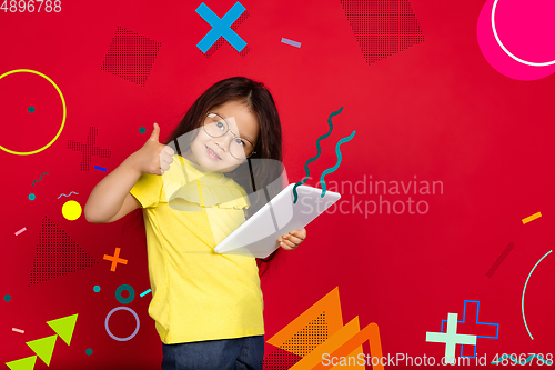 Image of Asian little girl portrait isolated on bright, modern illustrated background.