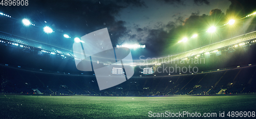 Image of Full stadium and neoned colorful flashlights background