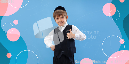 Image of Jewish boy portrait isolated on bright, modern illustrated background.