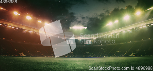 Image of Full stadium and neoned colorful flashlights background