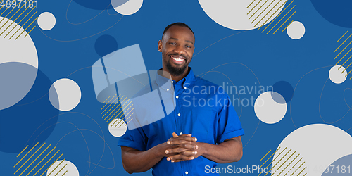 Image of African man\'s portrait isolated on bright, modern illustrated background.