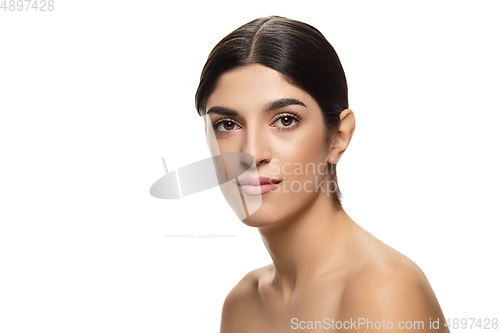 Image of Portrait of beautiful jewish woman isolated on white studio background. Beauty, fashion, skincare, cosmetics concept.