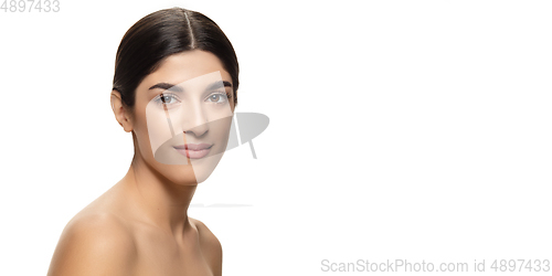 Image of Portrait of beautiful jewish woman isolated on white studio background. Beauty, fashion, skincare, cosmetics concept.