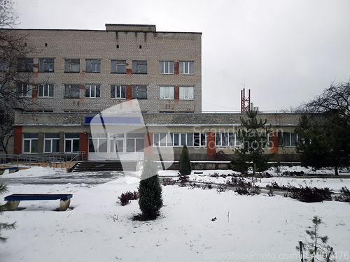 Image of white brick building