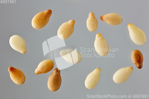 Image of sesame seeds on grey background