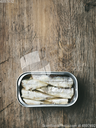 Image of open sardines can