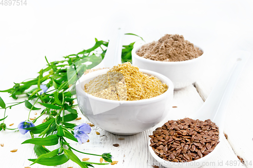 Image of Bran and flour flaxseed in bowls on board