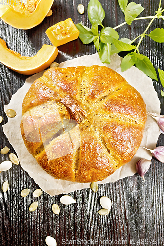 Image of Bread pumpkin on a dark board top