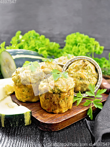 Image of Cupcake with cheese and zucchini on table